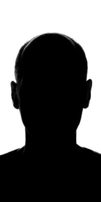 A man's head and shoulders silhouette isolated on white.